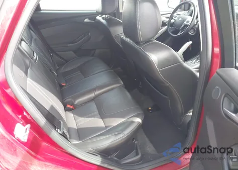 2013 Ford Focus Titanium z USA, uszkodzony, nr VIN 1FADP3N2XDL209491